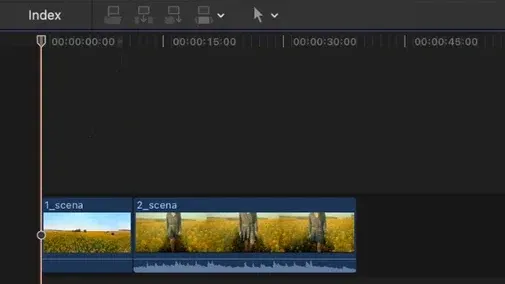Oś czasu w Final Cut Pro z dwoma klipami ułożonymi jeden za drugim: 1_scena i 2_scena, nad nimi linijka czasu